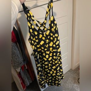 Criss cross backed lemon dress. Brand new. Never worn. Size 2X